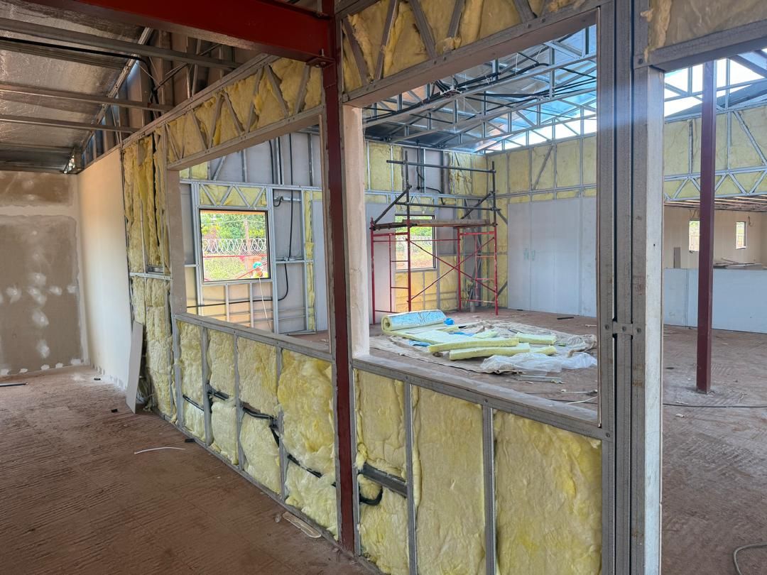 Dining hall: wall framing with insulation fitted, before cladding
