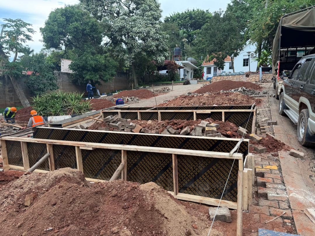 Timber formwork erected around the foundation trench