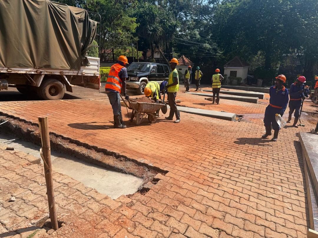 Foundations cast flush with the surface while paving is reinstated around them