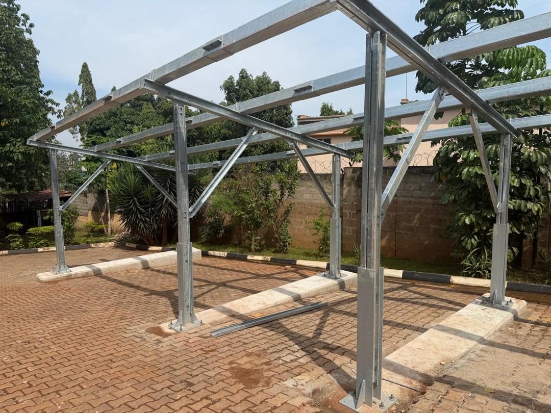 Galvanised steel solar parkade structure erected on the finished foundations